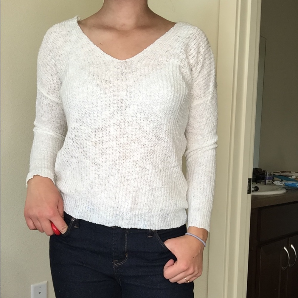 Open twist-back knit sweater